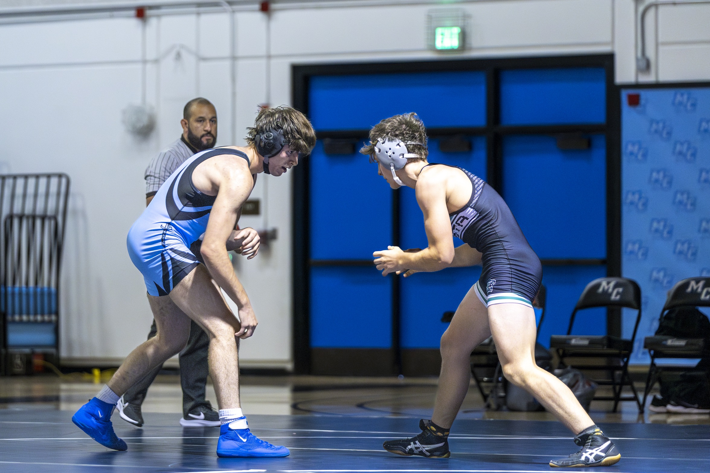 Wrestlers face off during match